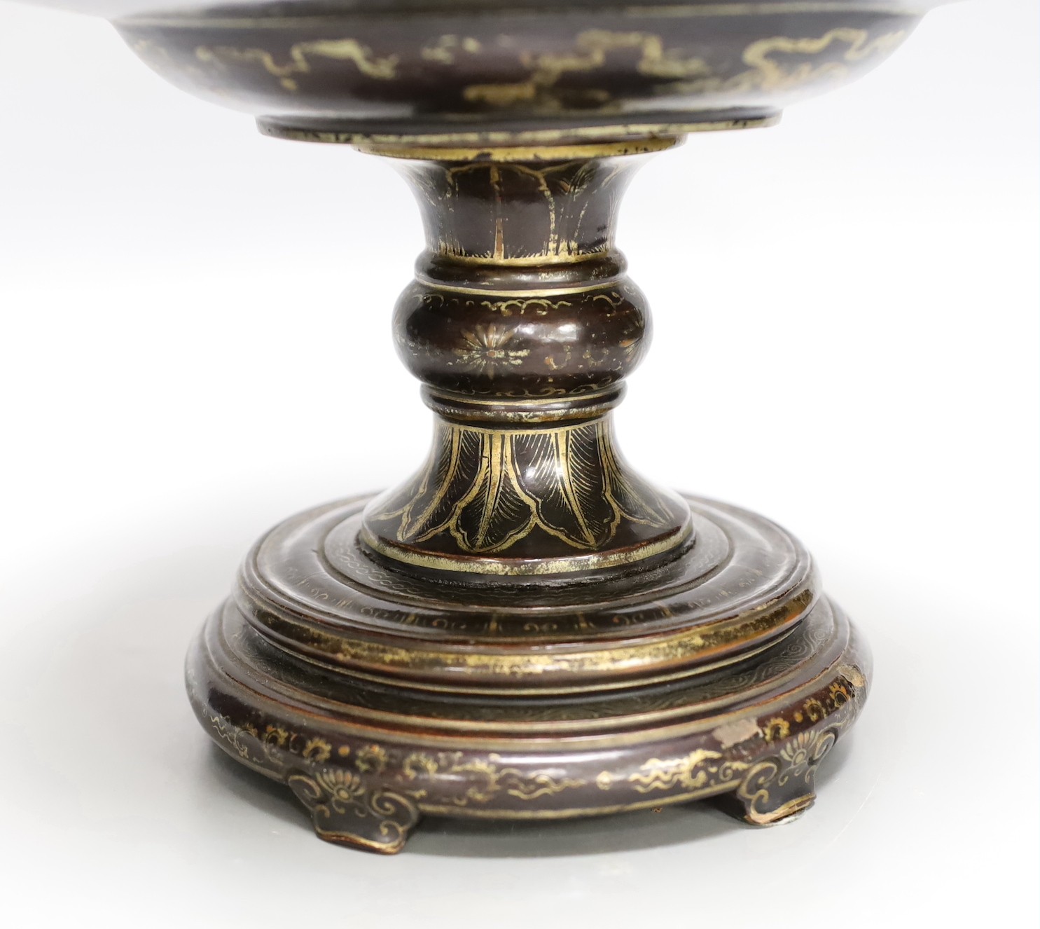 An 18th century Chinese lacquer pedestal dish, 23cm diameter